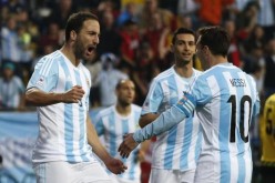 Argentina's Gonzalo Higuain (L) and team captain Lionel Messi (#10)