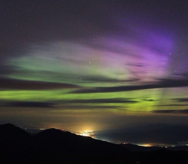 Northern lights seen over Mount Washington Observatory due to a solar flare that began last June 22.