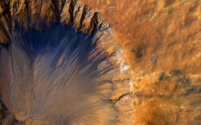 The HiRISE camera aboard NASA's Mars Reconnaissance Orbiter acquired this closeup image of a "fresh" (on a geological scale, though quite old on a human scale) impact crater in the Sirenum Fossae region of Mars on March 30, 2015.