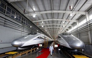 Two trains are on display while awaiting operation at the production base for Beijing-Shanghai bullet train in Qingdao. 