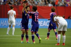 Japan defenders Saori Ariyoshi (#19) and Azusa Iwashimizu (#3)