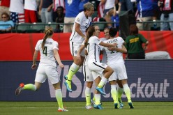 Alex Morgan is congratulated after scoring the opening goal for the U.S. against Colombia.