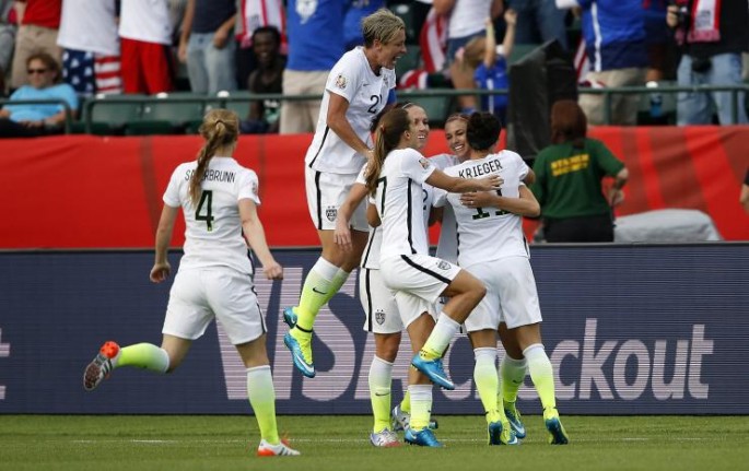 Alex Morgan is congratulated after scoring the opening goal for the U.S. against Colombia.