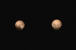 Dark spots on Pluto's surface baffle scientists