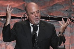 Singer Billy Joel speaks during the Songwriters Hall of Fame awards in New York in this file photo taken June 16, 2011. 