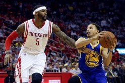 Houston's Josh Smith (L) tries to guard Golden State's Steph Curry during the 2015 Western Conference Finals.