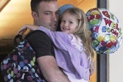 Ben Affleck, who is shown with one of his daughters, will remain an involved parent notwithstanding divorce from Jennifer Garner.