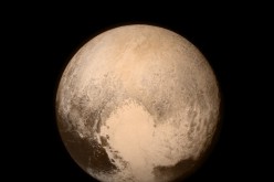Pluto nearly fills the frame in this image from the Long Range Reconnaissance Imager (LORRI) aboard NASA’s New Horizons spacecraft, taken on July 13, 2015 when the spacecraft was 476,000 miles (768,000 kilometers) from the surface
