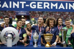 Paris St Germain's players after winning the French Cup final in December 2014.