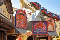 Wil Lawrence, is shown flying in Disneyland, one of the many creative snapshots taken by his doting father Alan Lawrence, who has launched a campaign to share knowledge and insights about Down's Syndrome.