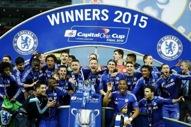 Chelsea players celebrate after winning the Capital One Cup.