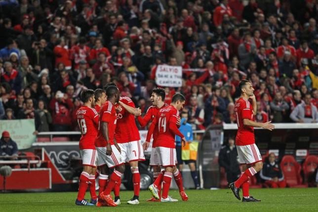 Benfica's players celebrate during a Portuguese League match at Luz stadium in February.