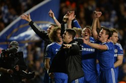 Chelsea players celebrate at the end of their Champions League quarterfinal second leg match against Paris St Germain.