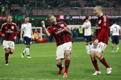 AC Milan's Jeremy Menez (C) celebrates after scoring against Cagliari during their Italian Serie A soccer match at Milan's San Siro stadium on March 21, 2015.