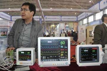 Some high-end medical equipment are displayed at an expo in Guiyang, Guizhou Province, March 14.