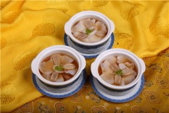 Duck tongues arranged like a peony in one of Quanjude’s soup dishes.