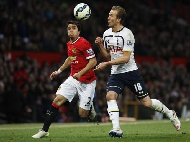 Manchester United's Rafael da Silva (L) in action with Tottenham Hotspur's Harry Kane last season.