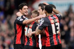 Bournemouth's Yann Kermorgant celebrates scoring their first goal with teammates during a match against Middlesbrough in the Sky Bet Championship last March.