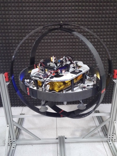 The Asteroid Prospector Flyer prototype in a testing gimbal.