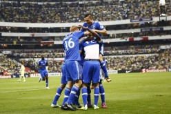 Montreal Impact players celebrate their lone goal in last season's first leg of the Concacaf Champions League final.