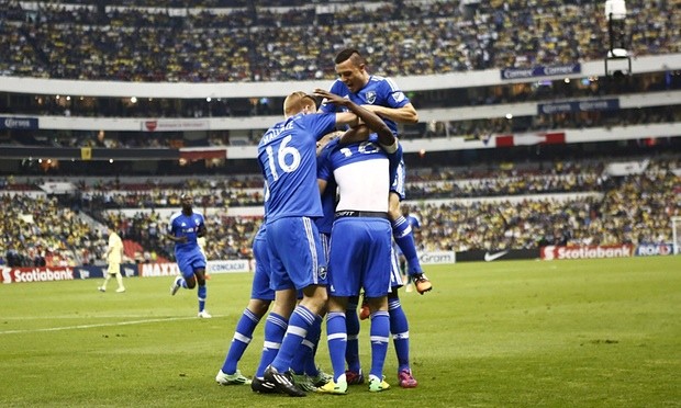 Montreal Impact players celebrate their lone goal in last season's first leg of the Concacaf Champions League final.
