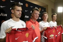 Manchester United boss Louis van Gaal (2nd from left) with his new acquisitions (from L to R) Morgan Schneiderlin, Bastian Schweinsteiger, and Matteo Darmian.