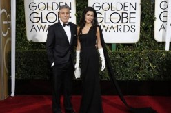 Actor George Clooney and his wife Amal Clooney arrive at the 72nd Golden Globe Awards in Beverly Hills, California January 11, 2015.