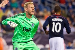 Vancouver FC goalkeeper David Ousted celebrates making a save versus the New England Revolution.