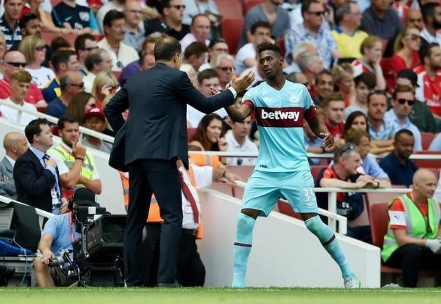 West Ham's new manager Slaven Bilic and Reece Oxford as he is subbed out during their 2-0 opening day upset win over Arsenal.