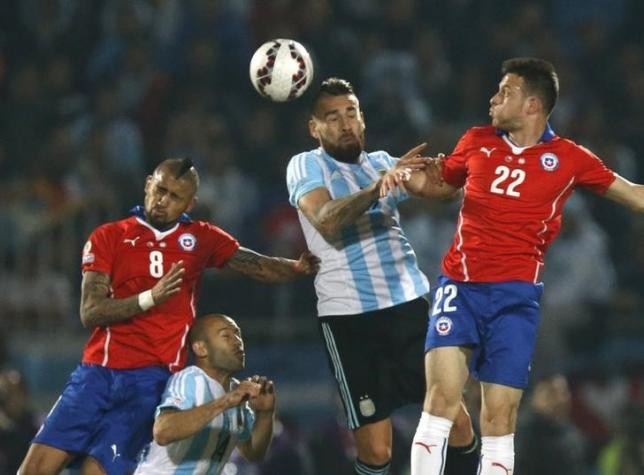 Argentina's Nicolas Otamendi (middle) is targeted by Manchester City.