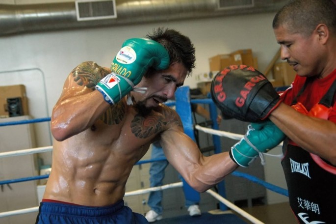 Antonio Margarito works mitts with trainer Robert Garcia