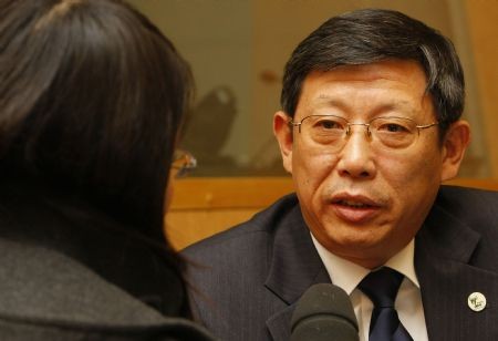 Shanghai Mayor Yang Xiong speaks to a reporter in this 2009 file photo.