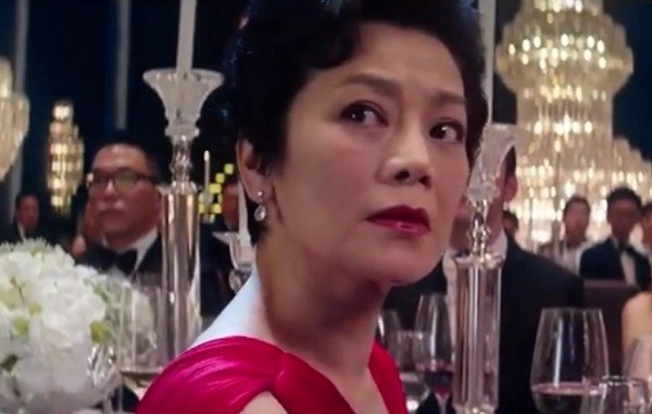 Sylvia Chang attends a dinner event in one scene of the upcoming musical drama, "Office."