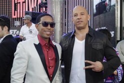 Cast member Chris ''Ludacris'' Bridges (L) poses with producer and cast member Vin Diesel during the premiere of their new film ''Fast & Furious 6''