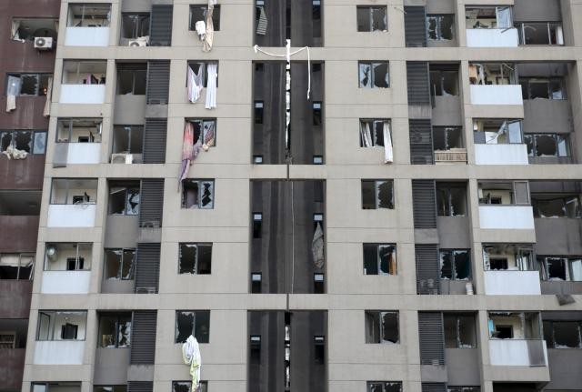 Apartment windows shattered by the blasts in Tianjin.