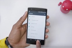 A user checks out the OnePlus smartphone.