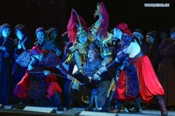 Chinese artists performing the three-act Italian play Turandot.