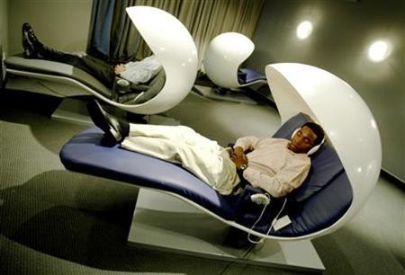 man in "napping pod"