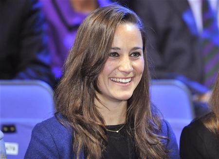 Pippa Middleton watches the men's singles tennis final between Jo-Wilfried Tsonga of France and Roger Federer of Switzerland at the ATP World Tour Finals at the O2 Arena in London November 27, 2011.