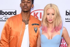 Athlete Nick Young and musician Iggy Azalea attend the 2015 Billboard Music Awards at MGM Grand Garden Arena on May 17, 2015 in Las Vegas, Nevada.