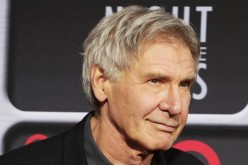 Actor Harrison Ford poses as he arrives at Target Presents AFI Night at the Movies in Hollywood April 24, 2013. 