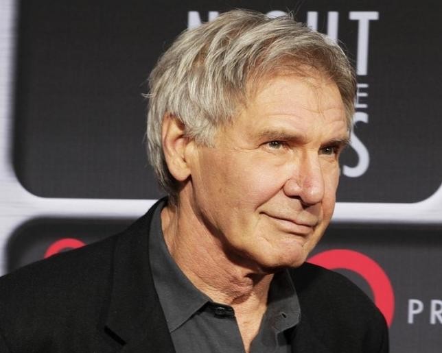Actor Harrison Ford poses as he arrives at Target Presents AFI Night at the Movies in Hollywood April 24, 2013. 