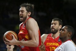 Pau Gasol (L) will play for Spain in the 2015 EuroBasket, while brother Marc (#13) will not.