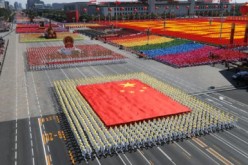 The giant Chinese national flag was carried by participants during a national parade in 2009.