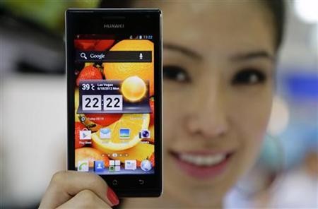 A model shows off a Huawei Ascend P1 smartphone.