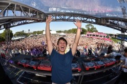 DJ Ansolo, who recently inked a deal with Island Records, is shown having a blast at Electric Zoo.