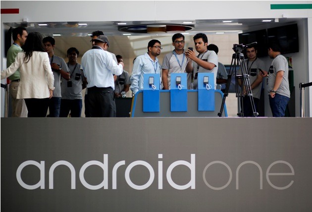 Visitors look at Android One Based mobiles