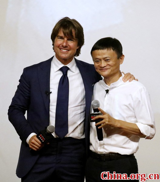 Tom Cruise and Jack Ma pose for photos at the premiere of "Mission: Impossible - Rogue Nation" in Shanghai, on Sept. 6, 2015.