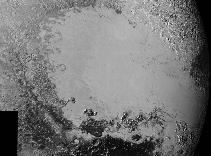Mosaic of high-resolution images of Pluto, sent back from NASA’s New Horizons spacecraft from Sept. 5 to 7, 2015. The image is dominated by the informally-named icy plain Sputnik Planum, the smooth, bright region across the center.