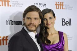 Cast member Daniel Bruehl poses on the red carpet with girlfriend Felicitas Rombold before a screening of the film ''Rush'' at Roy Thomson Hall during the 38th Toronto International Film Festival in Toronto September 8, 2013.